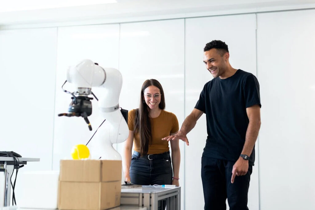 engineers-developing-robotic-arm